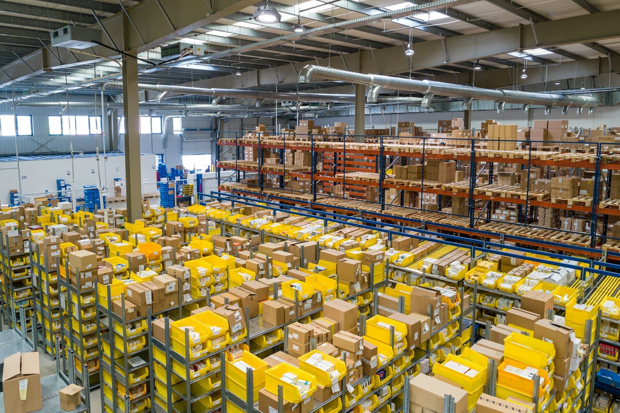 Aerial view of parcels staged across a fulfilment warehouse