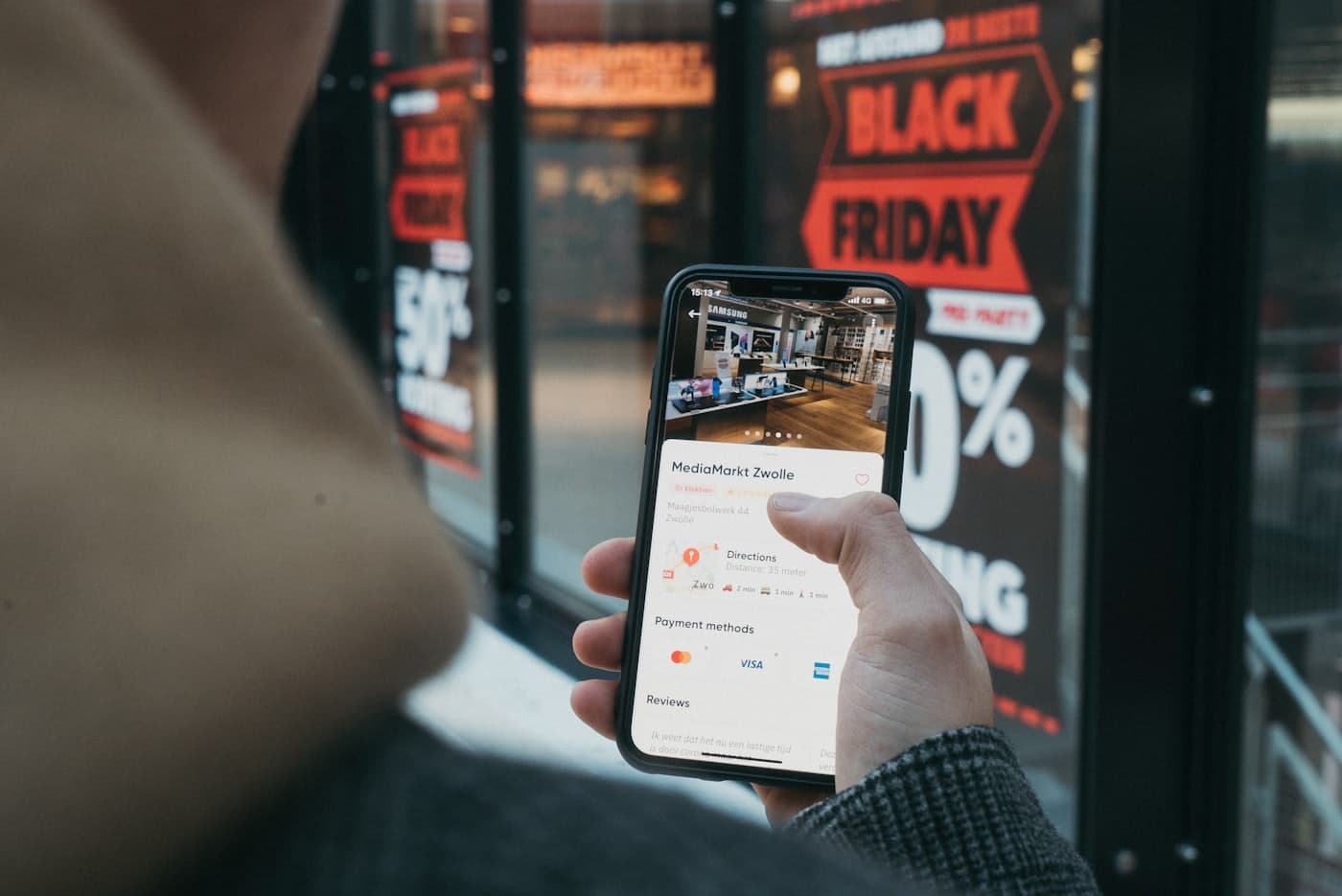 A customer placing an order on a mobile phone